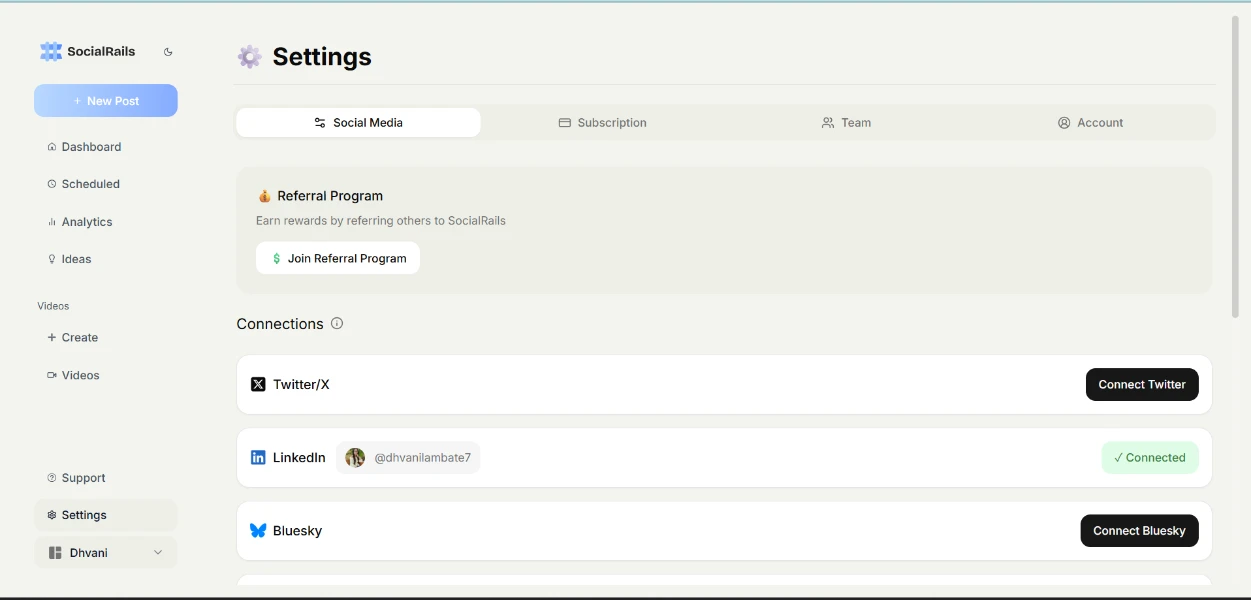 SocialRails settings page with social media connection and referral program options.
